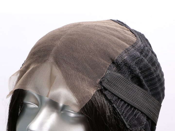 Close-up wig cap of 100% natural curly virgin hair texture