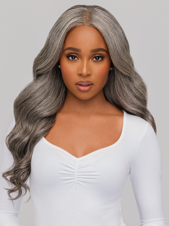Indique Pure Gray Wavy wefted hair extensions in silver-gray with defined waves.
