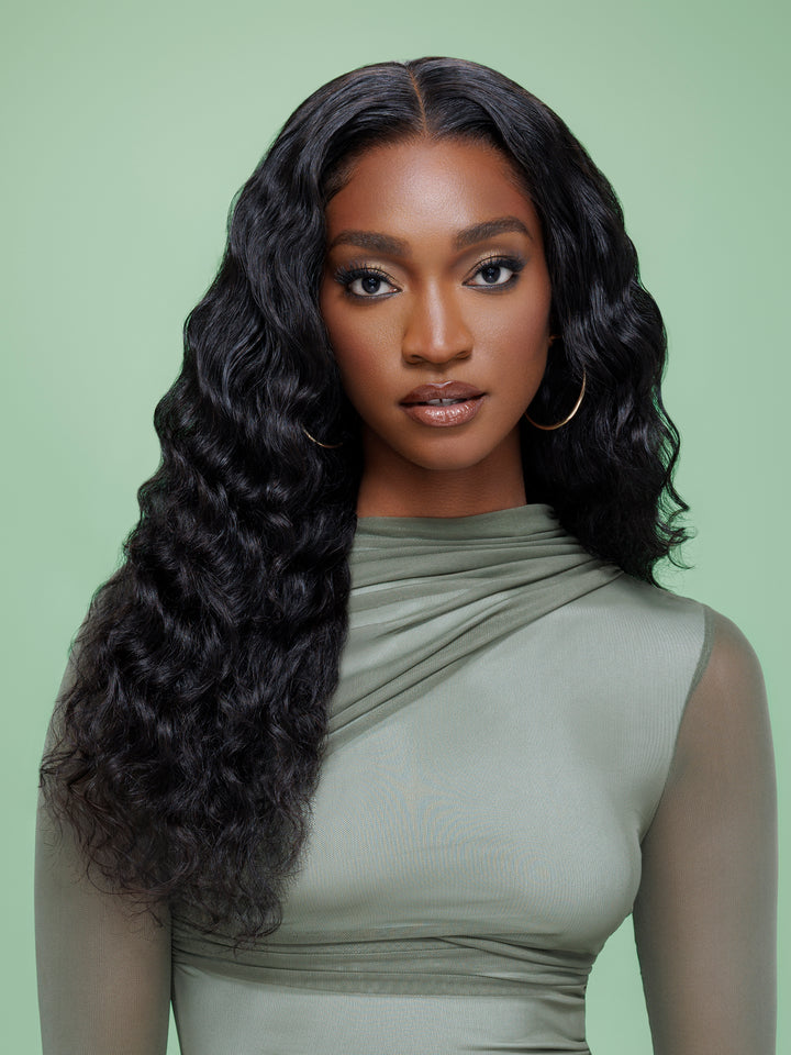 Long deep wave black hair extensions on woman